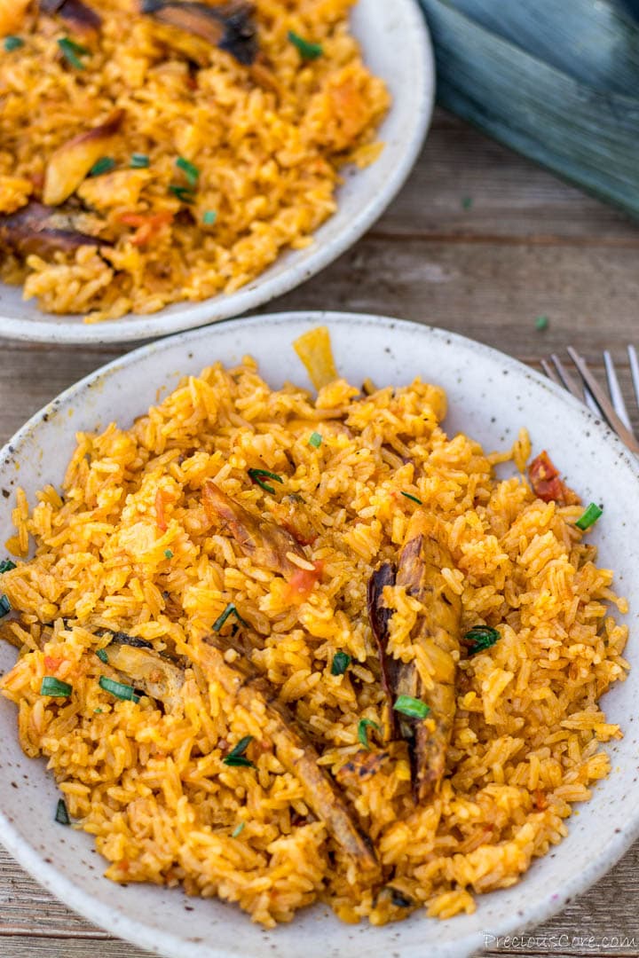 palm oil jollof rice in bowls