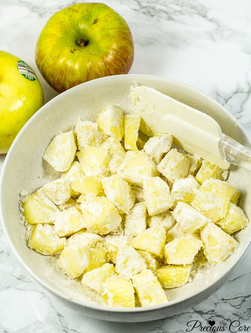 Chunks of apple tossed with flour.