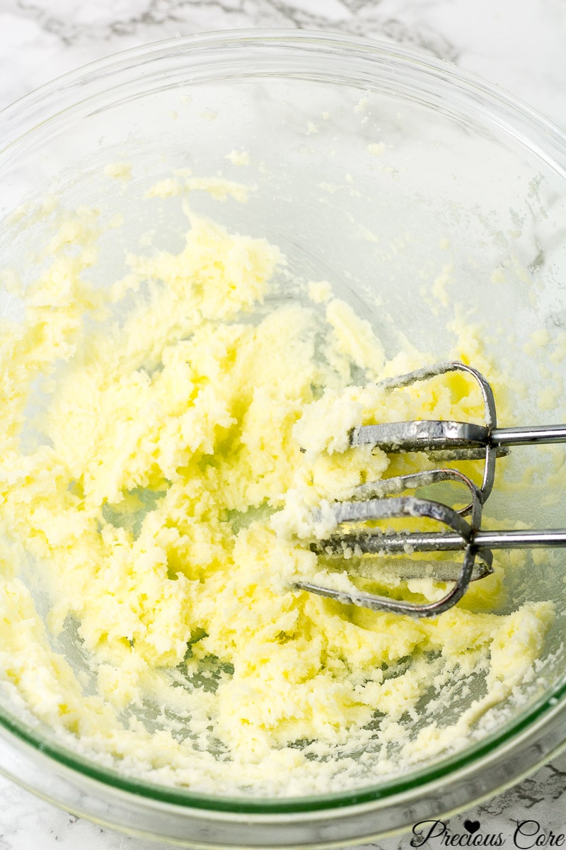 Creaming butter an sugar in a mixing bowl.