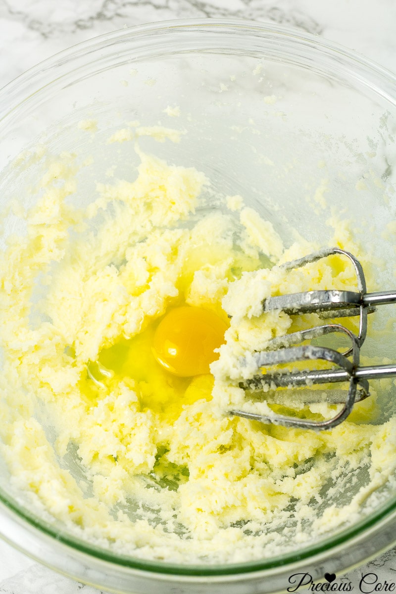 Eggs added to creamed butter and sugar.