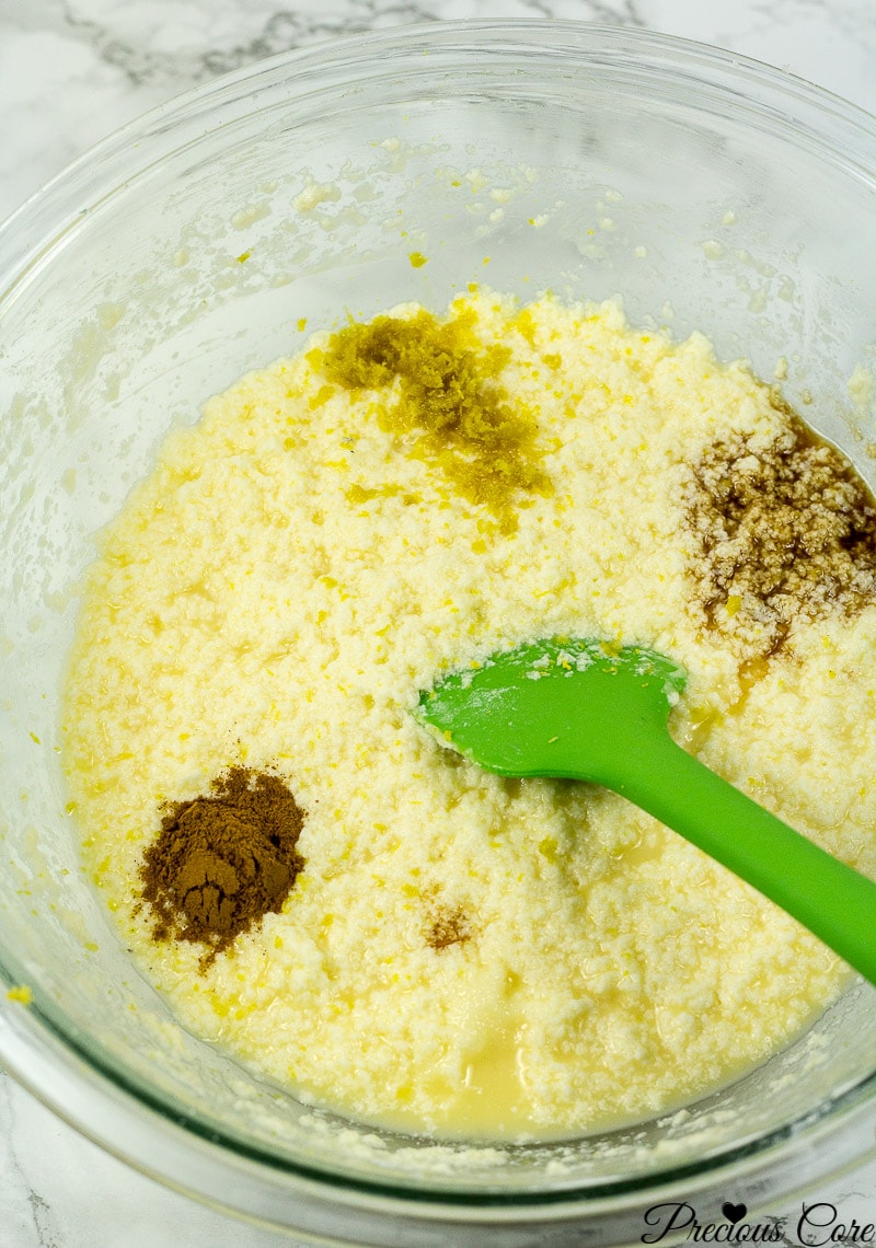 Wet ingredients for apple cake with spices added.