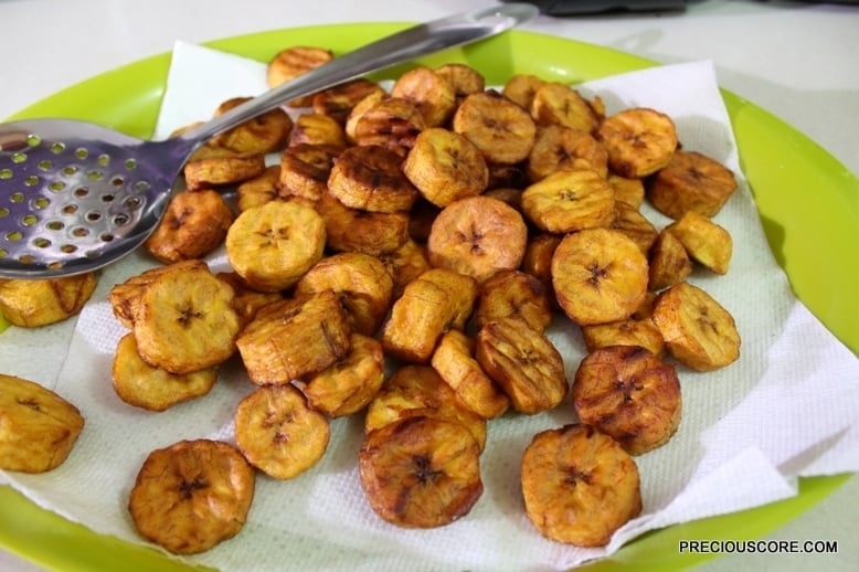 Fried plantains on a paper towel.