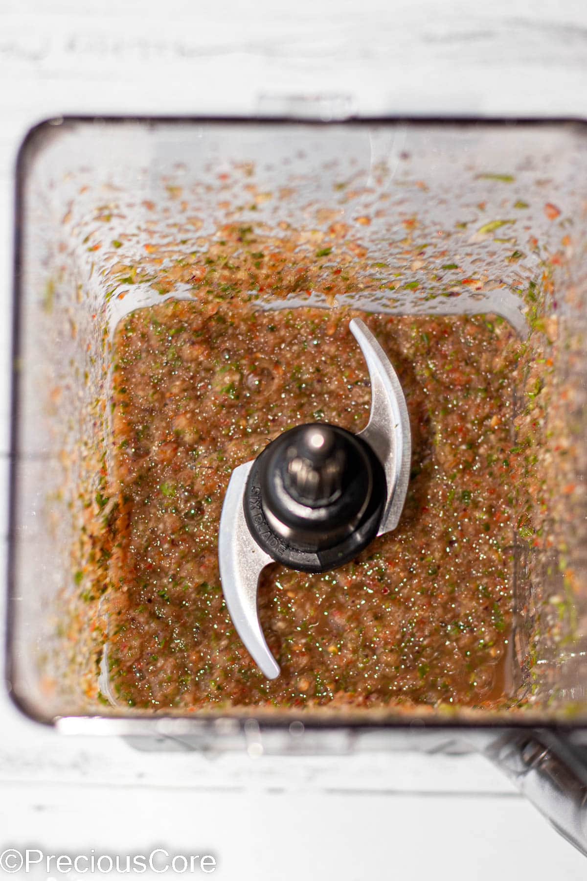 Pepper sauce ingredients blended in a blender.