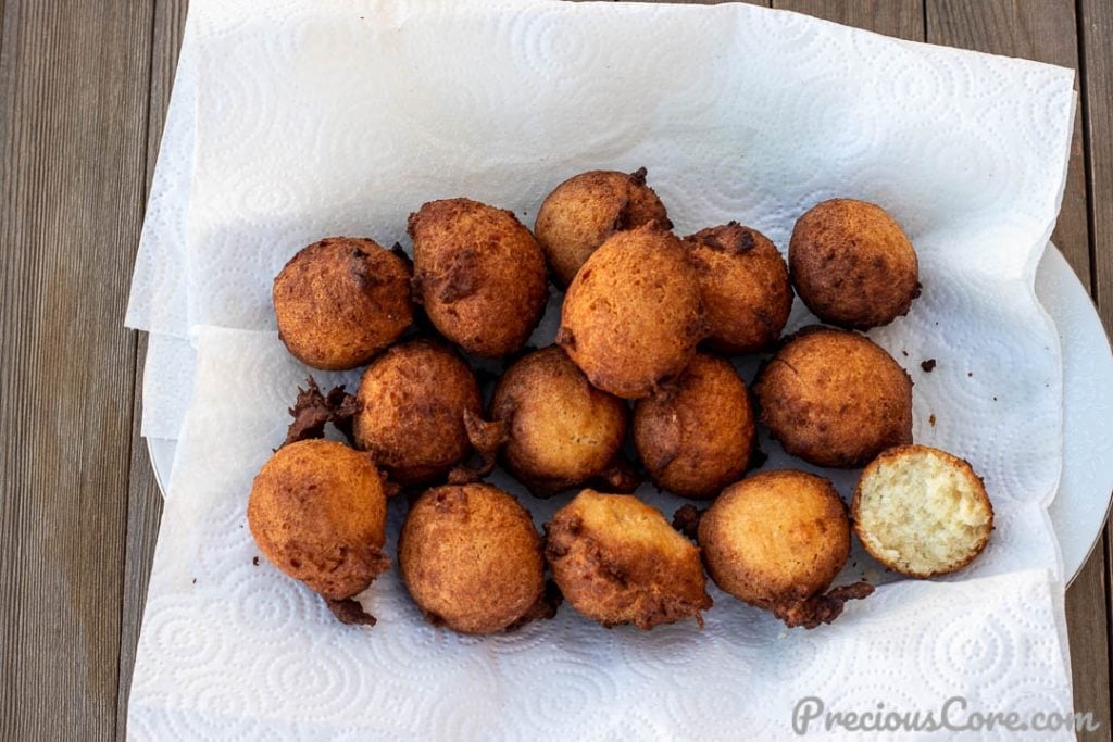 Landscape picture of coconut doughnuts with bite taken out of one