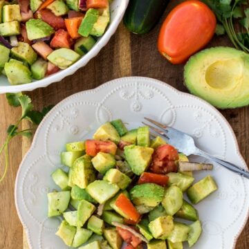 Avocado salad on a plate. Bowl of avocado salad.