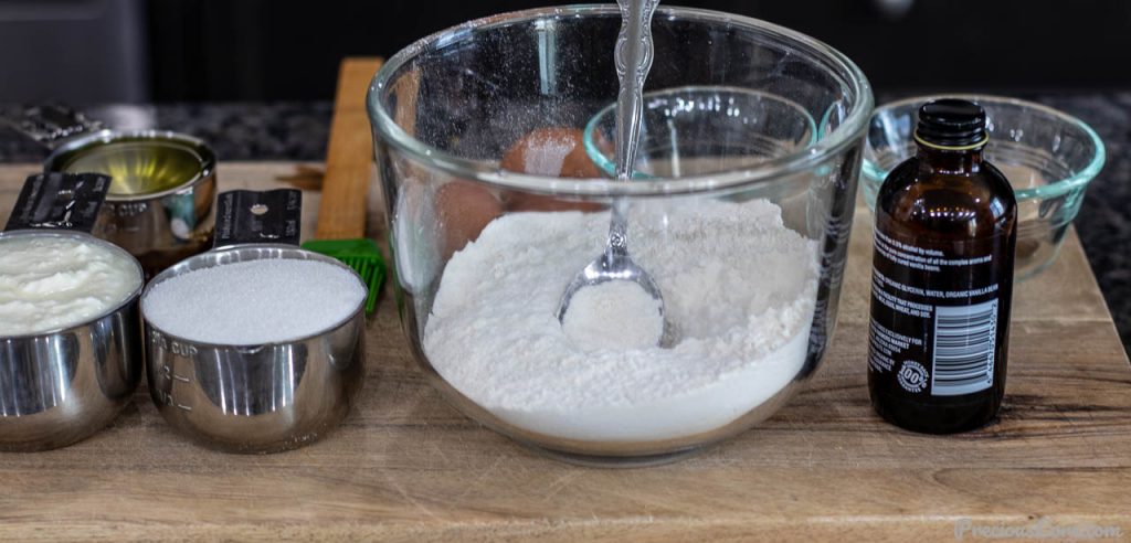 Ingredients for yogurt cake on a chopping board