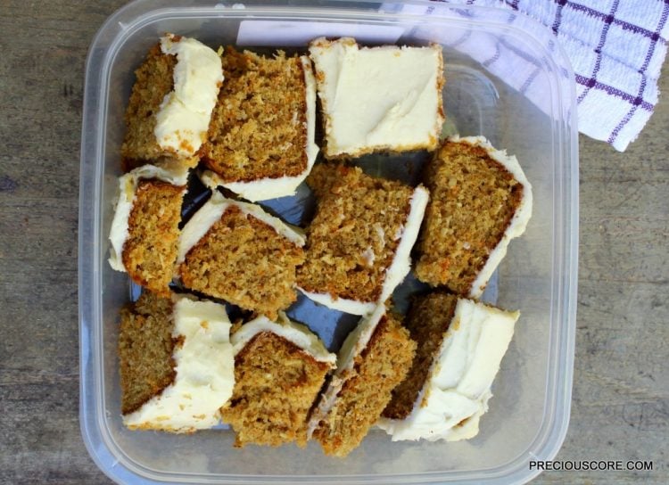 Pieces of carrot cake in a container.