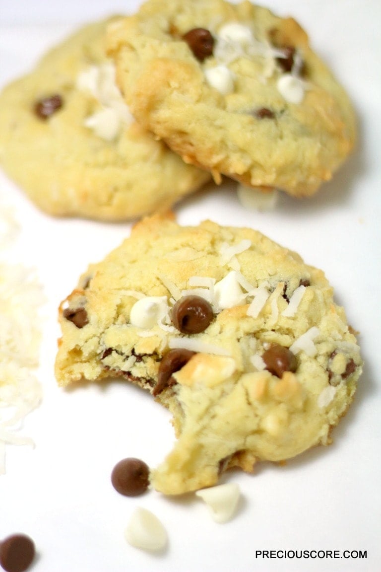 Coconut chocolate chip cookie missing a bite.