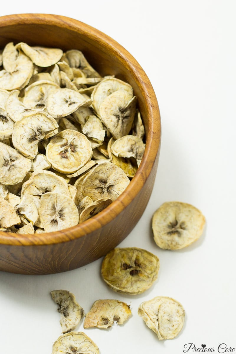 Wooden bowl of dried plantains.