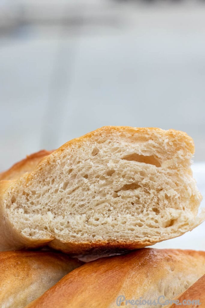 Cut loaf of French Bread showing airy texture