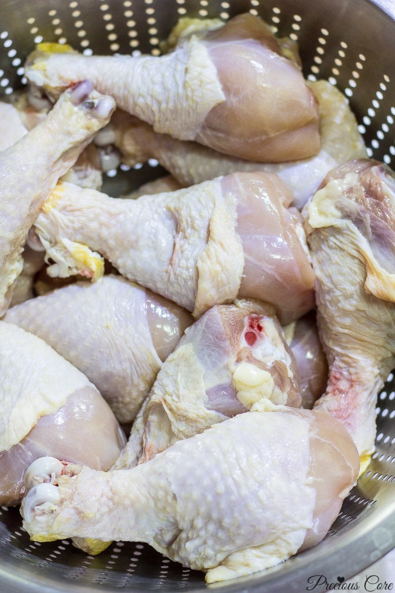 Chicken drumsticks in a porous pan.