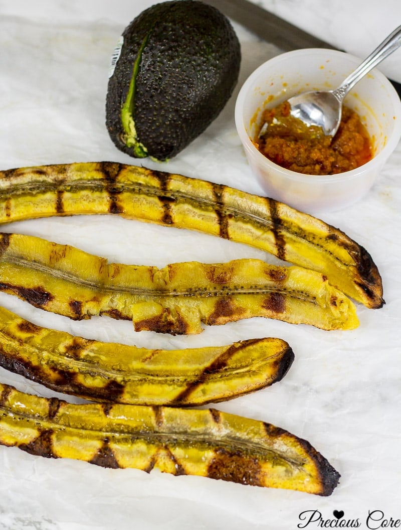 Halved plantains with grill marks.