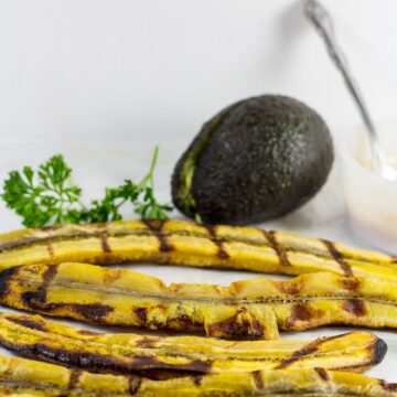 Grilled plantains with an avocado.