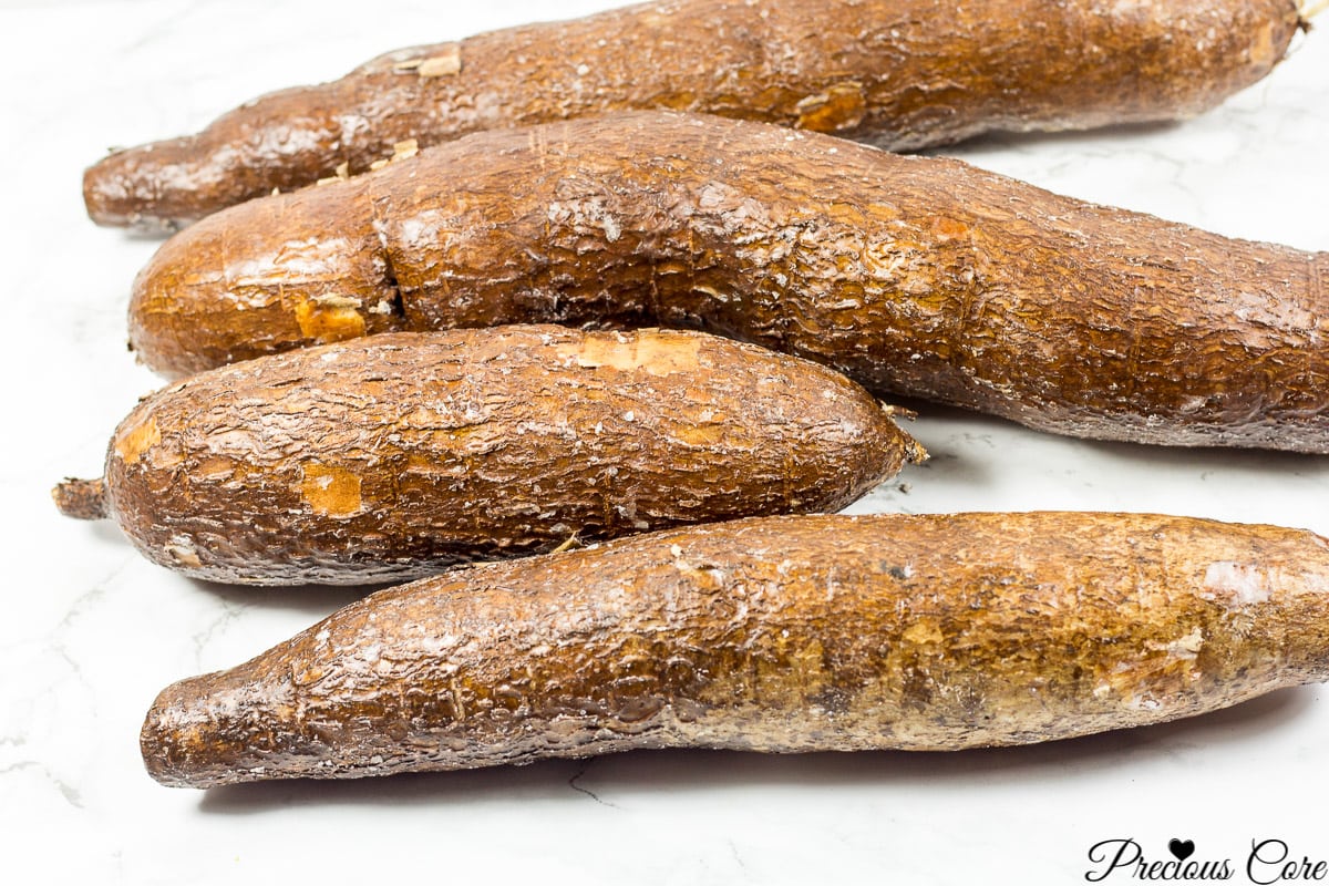 Four cassava on a counter.