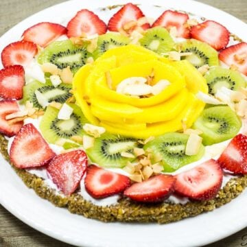 Colorful breakfast pizza with cereal crust.
