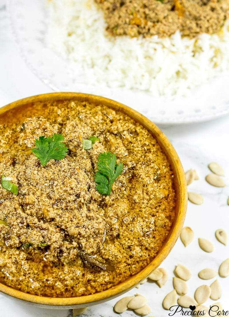 Egusi Stew in a wooden bowl.