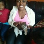 PRECIOUS HOLDS A DOG : OVERCOMING THE FEAR OF DOGS