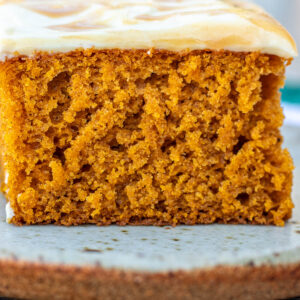 A tall slice of pumpkin cake.