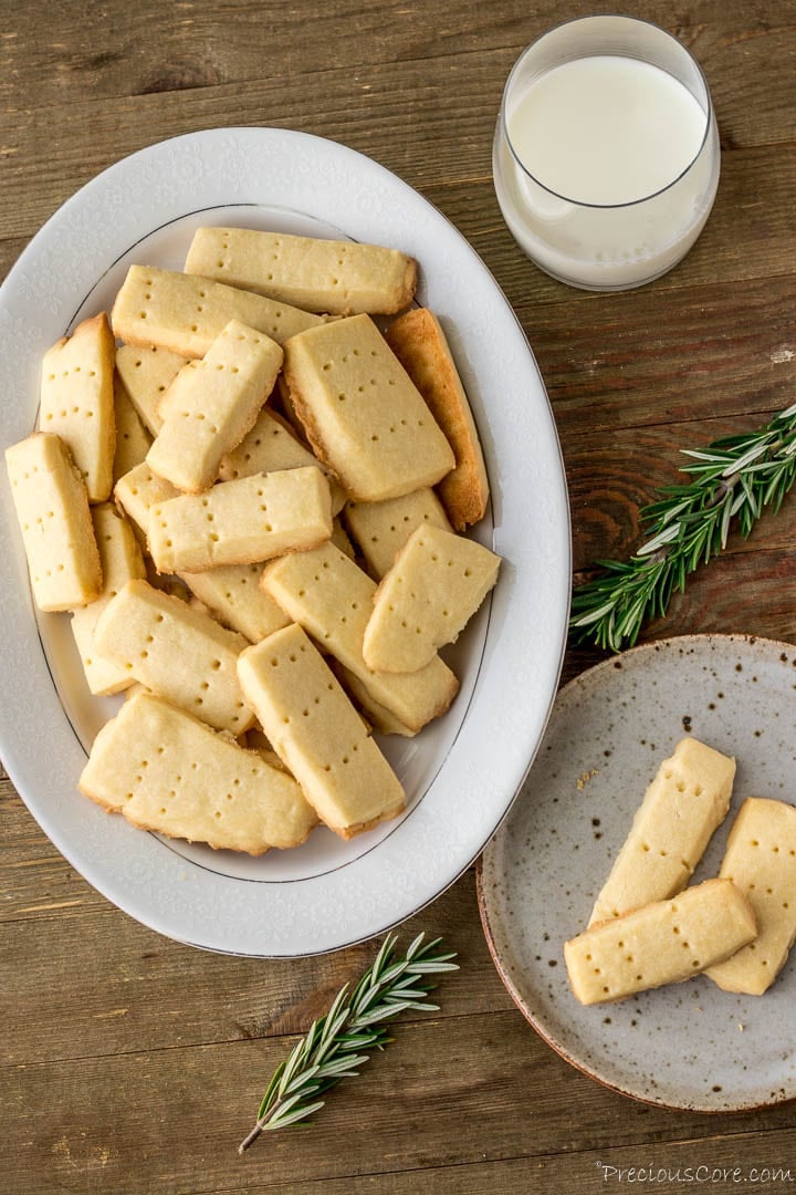 Shortbread cookies on plate and platter served with milk