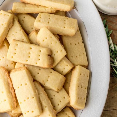 Shortbread Cookies on a platter with milk on the side