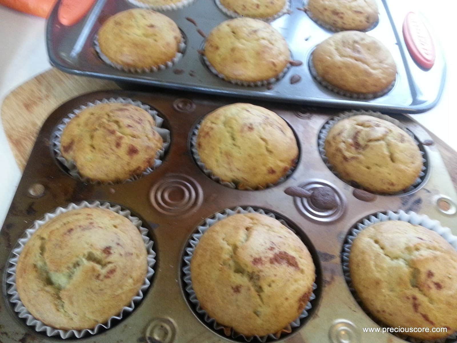 Muffin pans full of Cameroon banana cakes.