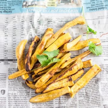 Fries on a newspaper.