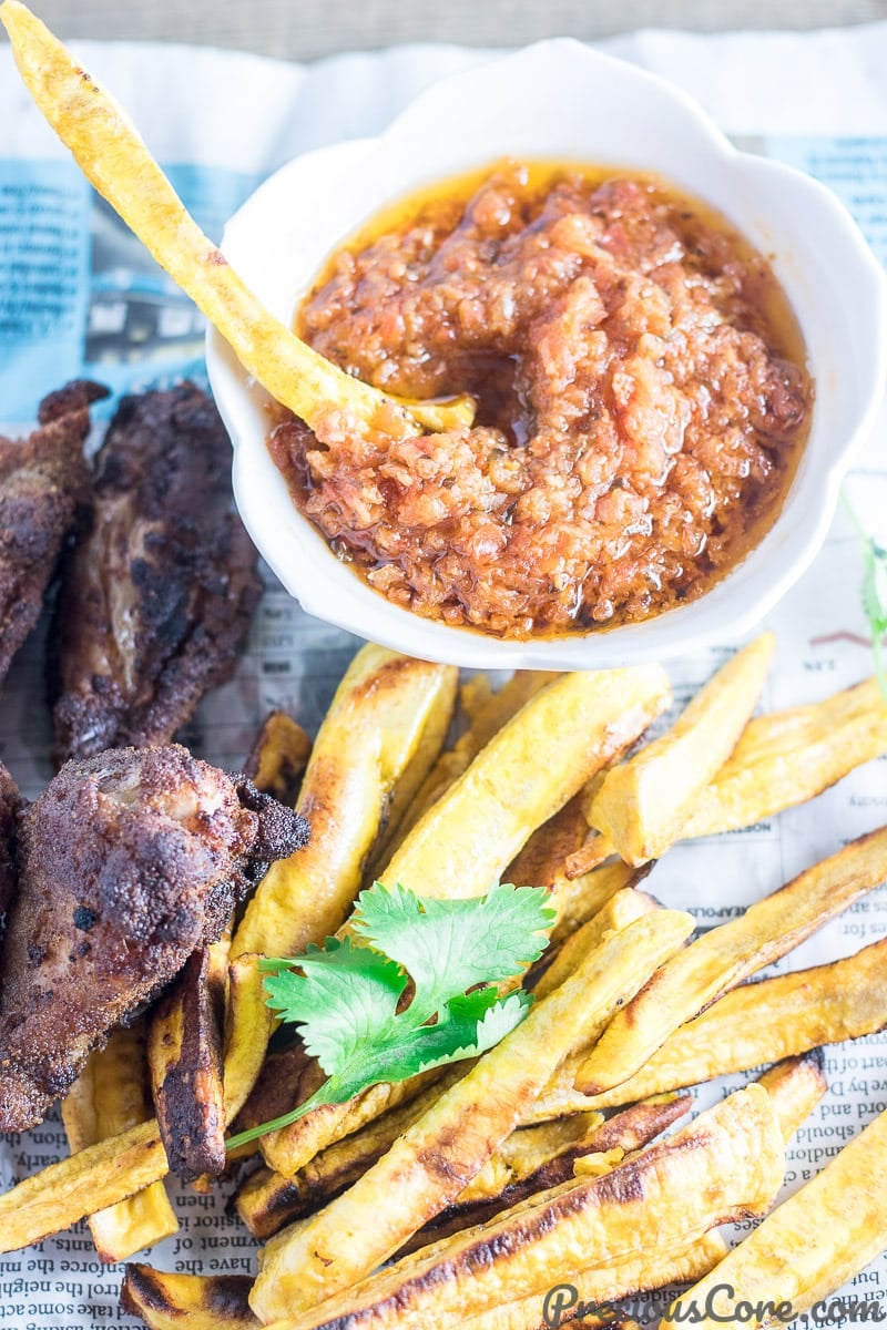 Plantain Fries with dipping sauce and wings.