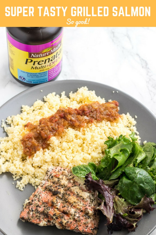 Plate of food with a bottle of Nature Made prenatal vitamins with text \"Super Tasty Grilled Salmon So good!\"