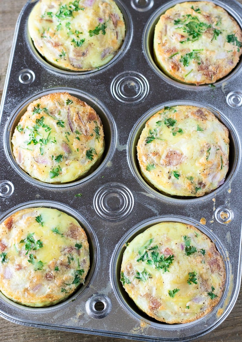 Egg Muffin Cups with potato and sausage in a muffin pan.