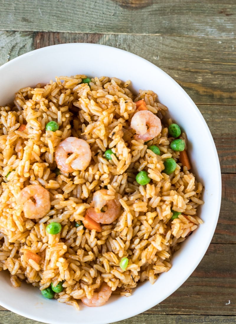 A plate of Jollof Rice with Shrimp. African Dinner Recipe.