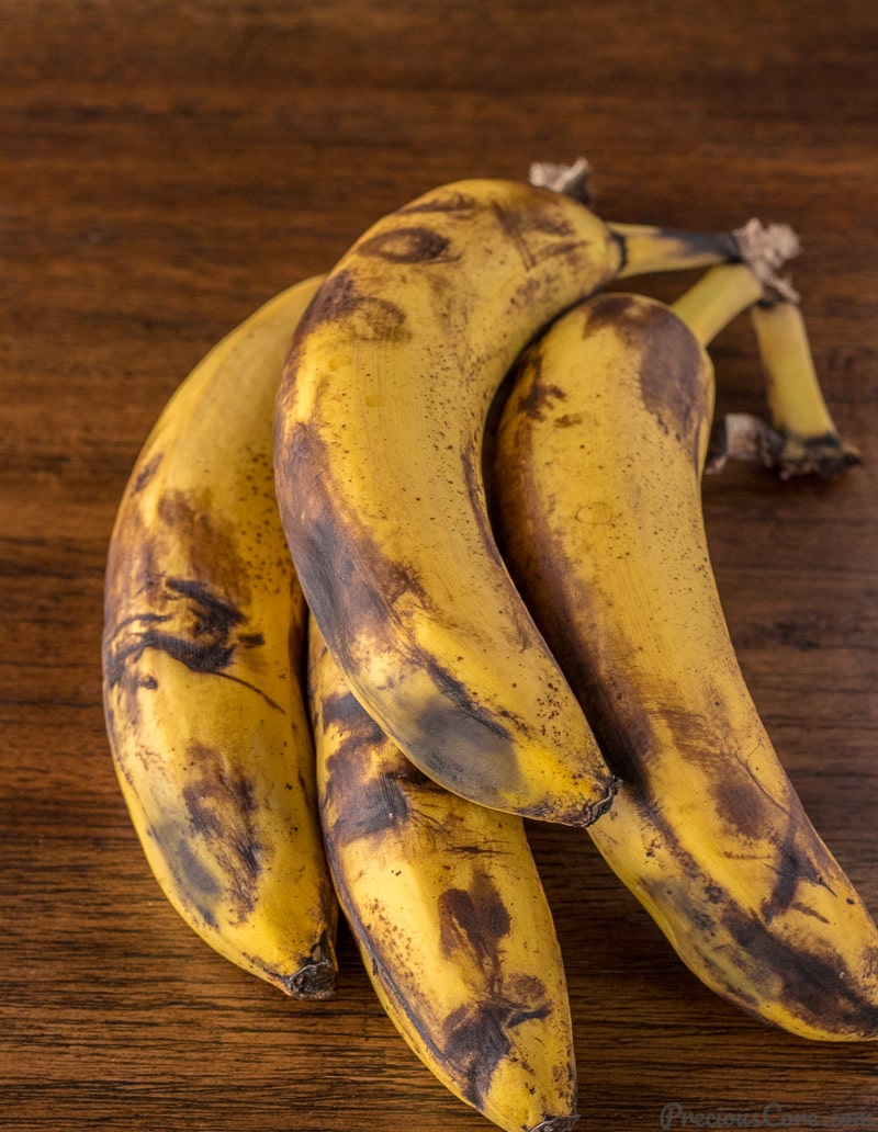 Overripe bananas with black spots.