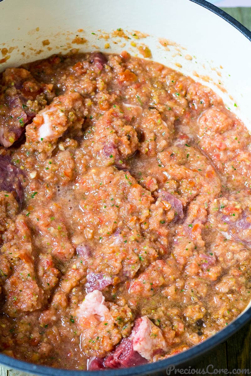 Beef and vegetable mixture in a pot.