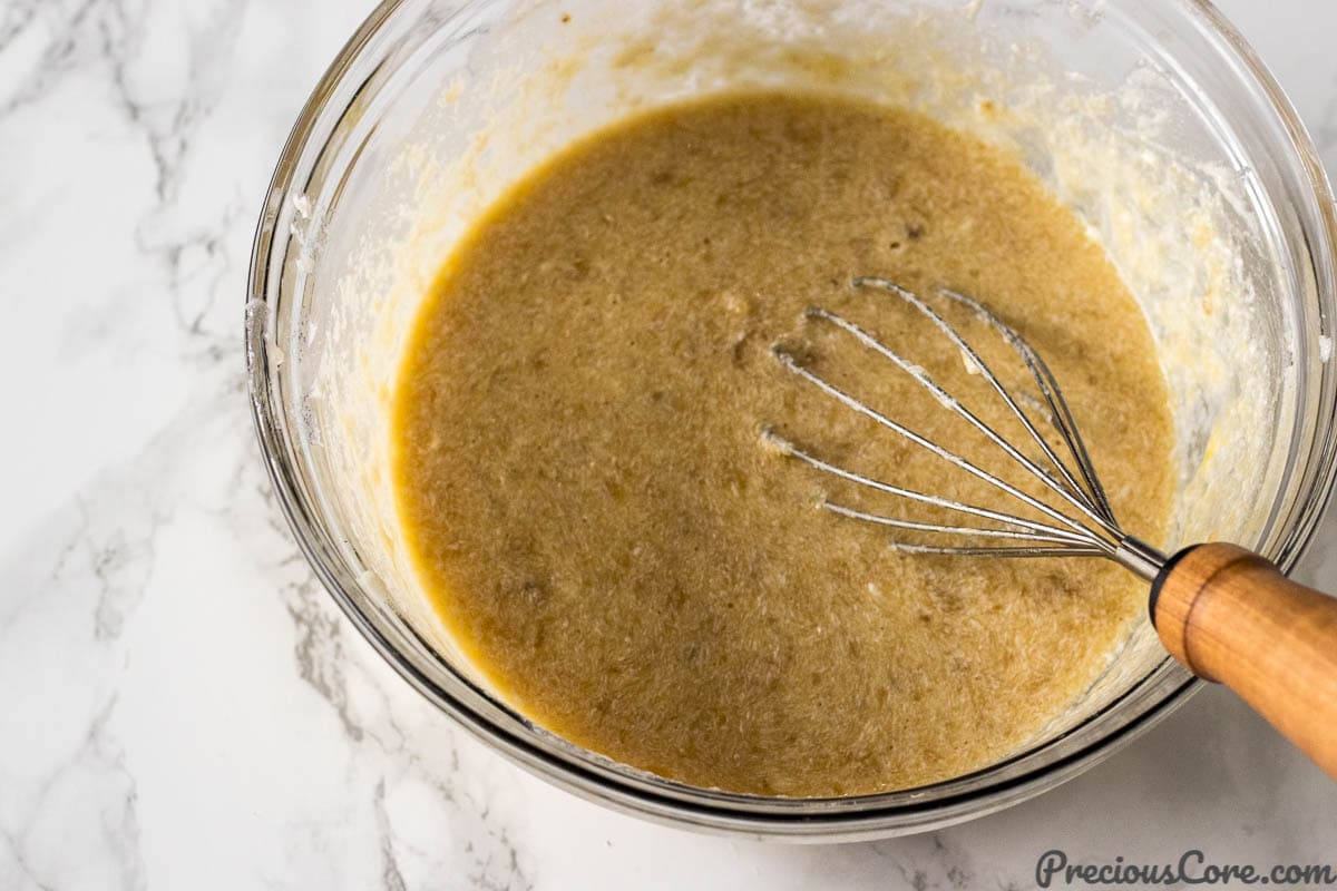 Mixing wet ingredients for Easy Moist Banana Bread Recipe