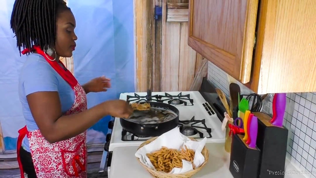 Deep frying chin chin in oil