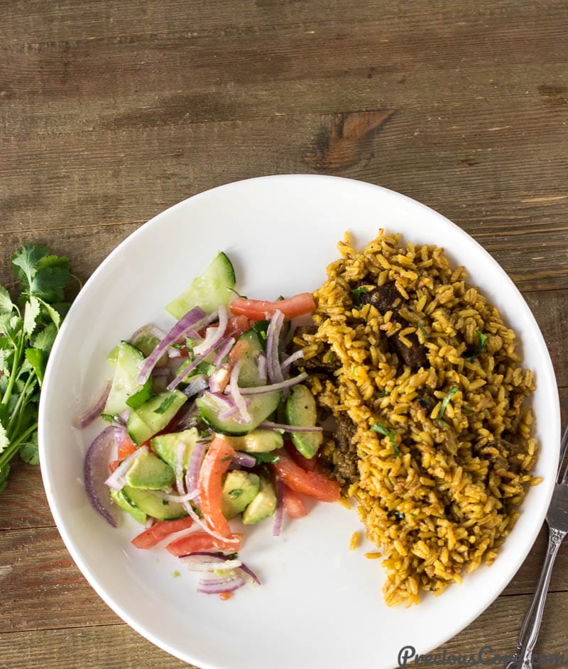 Pilau and Kachumbari on a plate