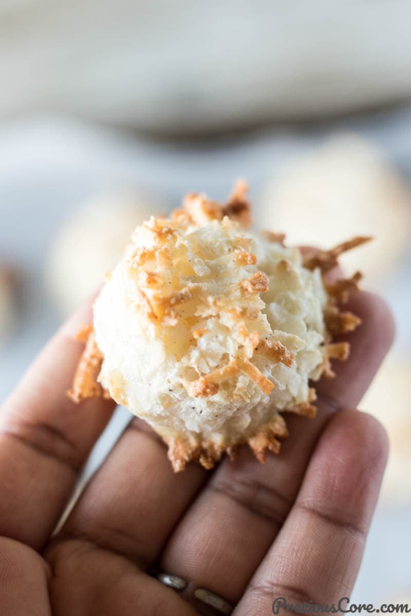 Hand holding a coconut macaroon