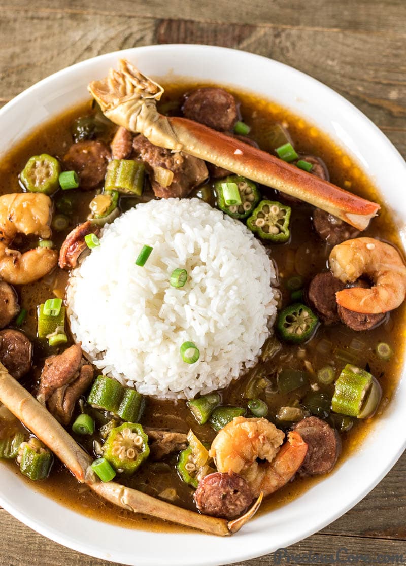 Seafood Gumbo and rice on a plate.