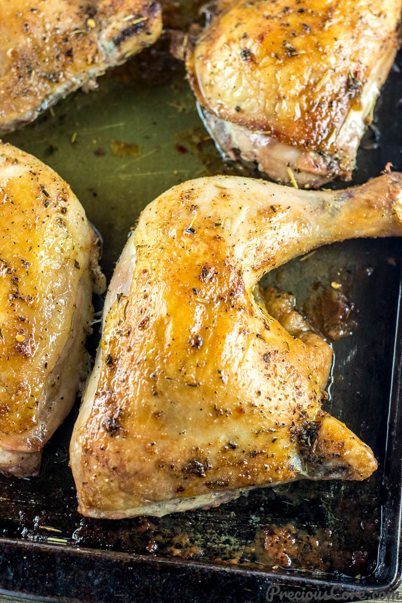 Close-up shot of a baked chicken leg quarter