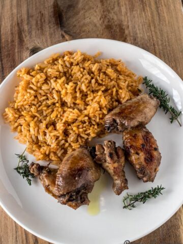 Jerk chicken on a plate and rice
