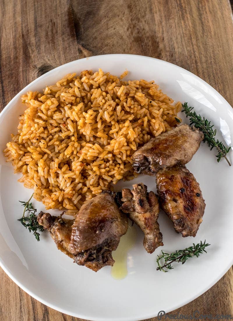 Jerk chicken on a plate and rice