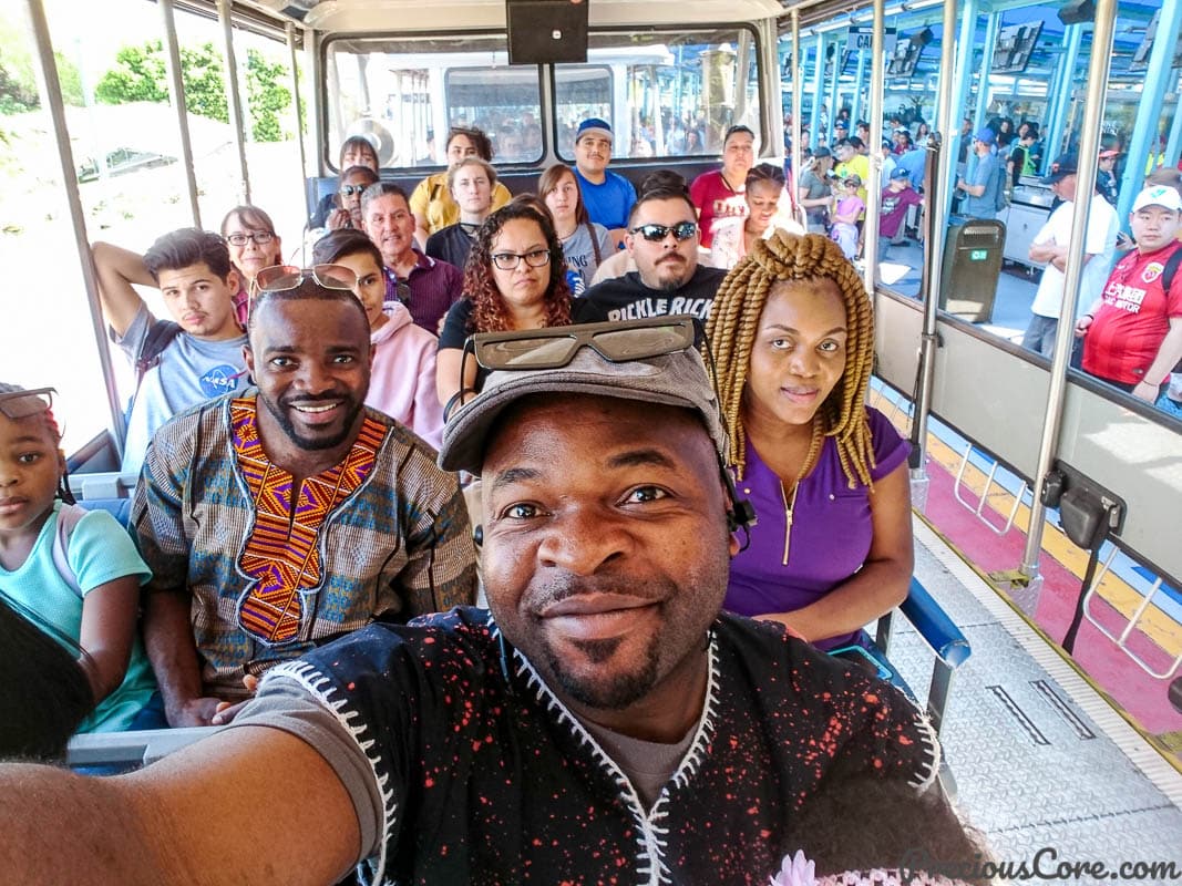 People sitting on a tram.