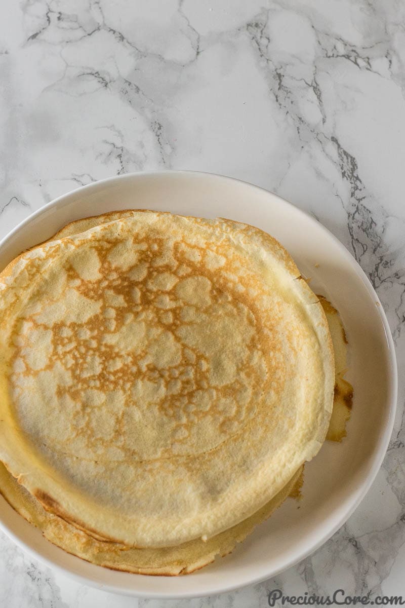 Thin crepes on a white plate