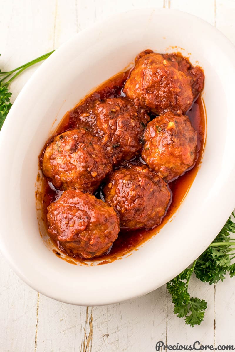 Chicken meatballs with tomato sauce in serving bowl