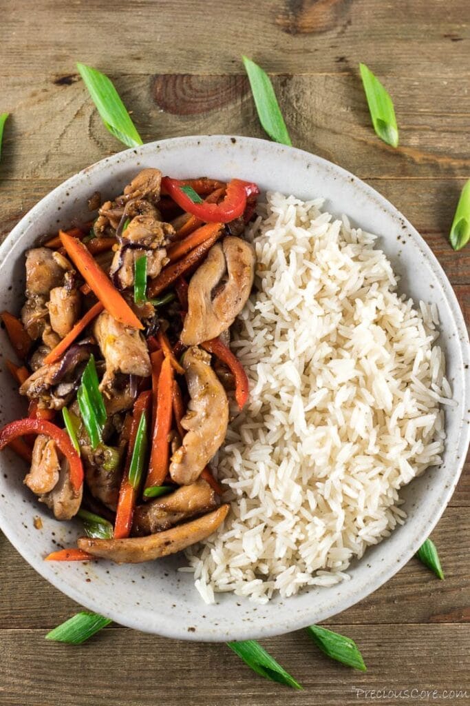 A bowl of rice and chicken stir fry. Easy dinner recipe for family