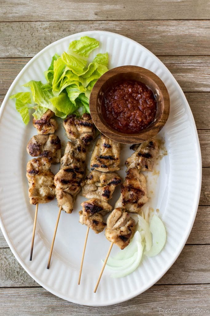 Chicken skewers on serving platter