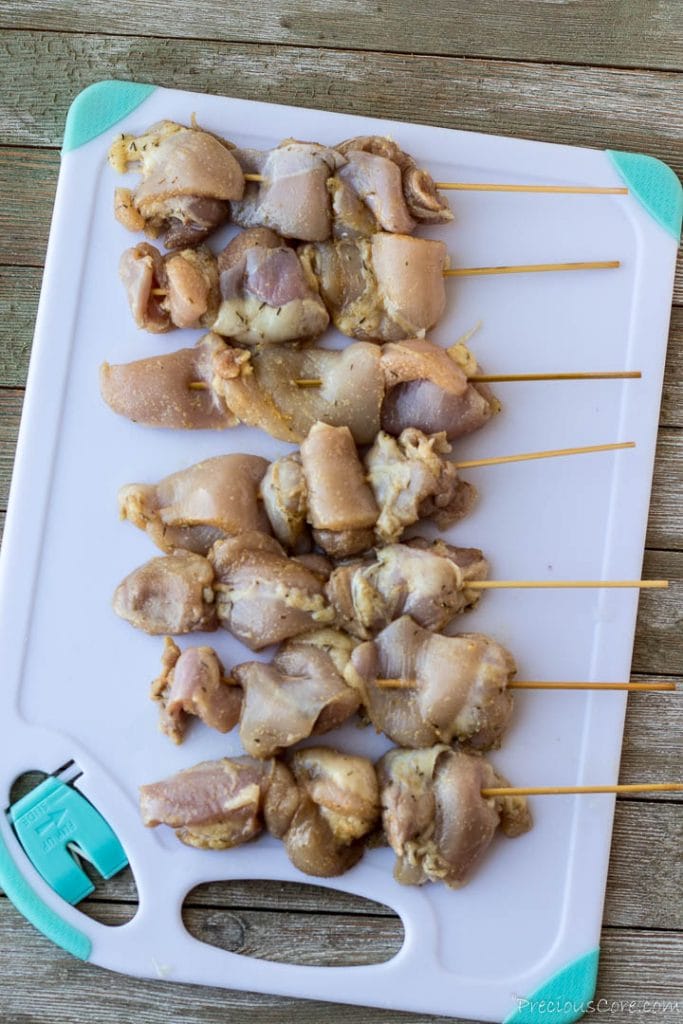 Raw chicken on skewers