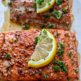 Baked salmon on parchment paper.