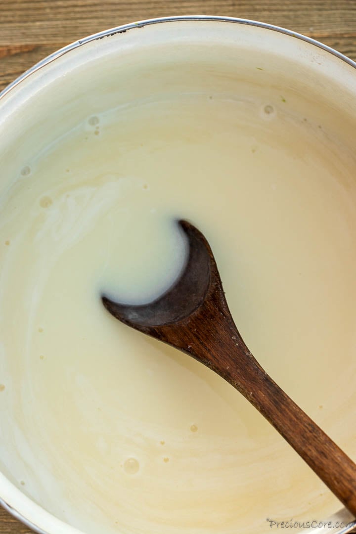 Bread pudding sauce with coconut milk in pot