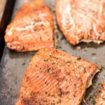 Baked salmon on baking sheet, easy dinner recipe for family