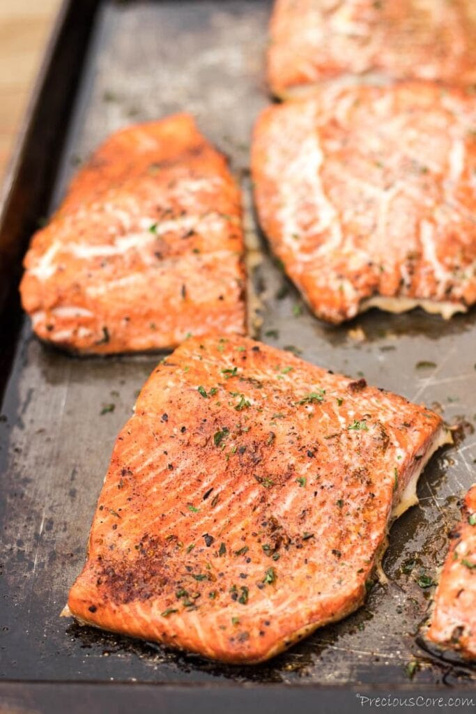 Baked salmon on baking sheet, easy dinner recipe for family